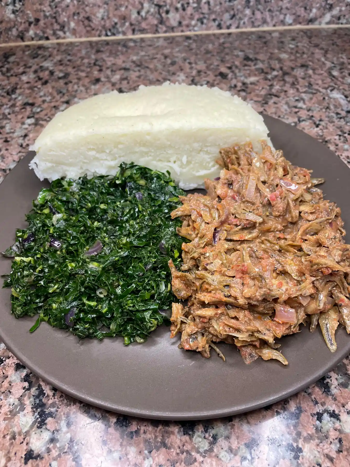 Ugali,creamy omena and sukuma
